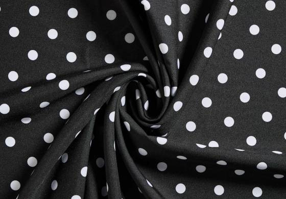 Zwarte stof met witte stippen