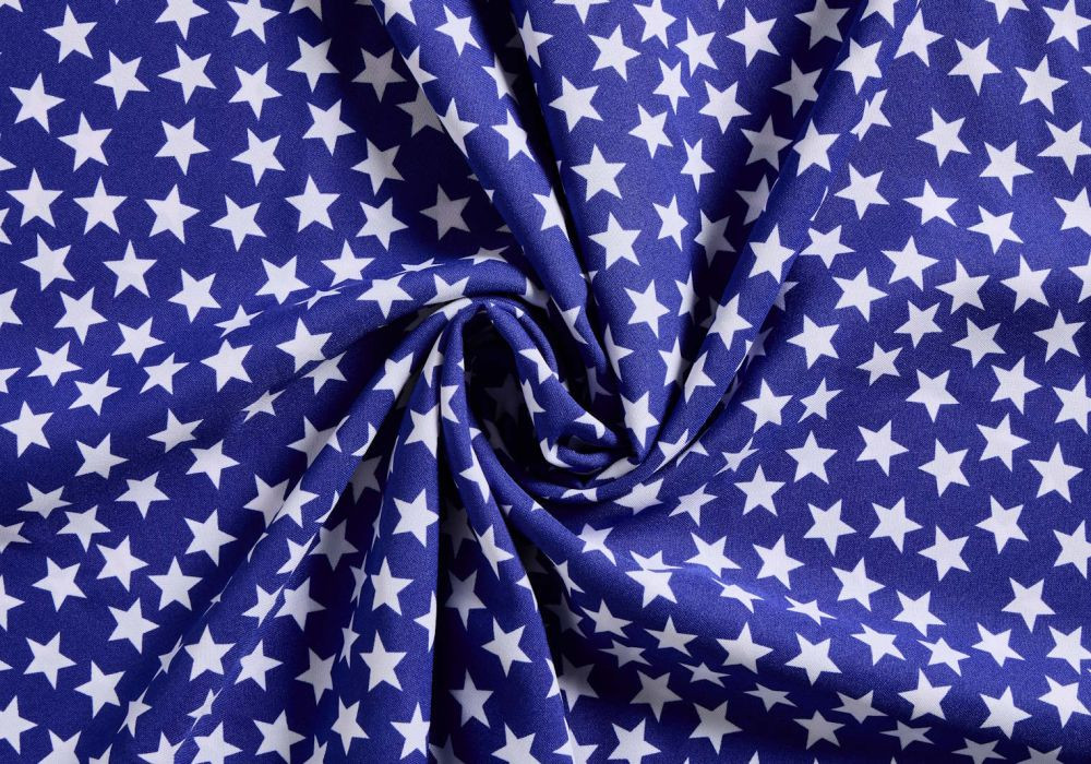Blauwe stof met witte sterren