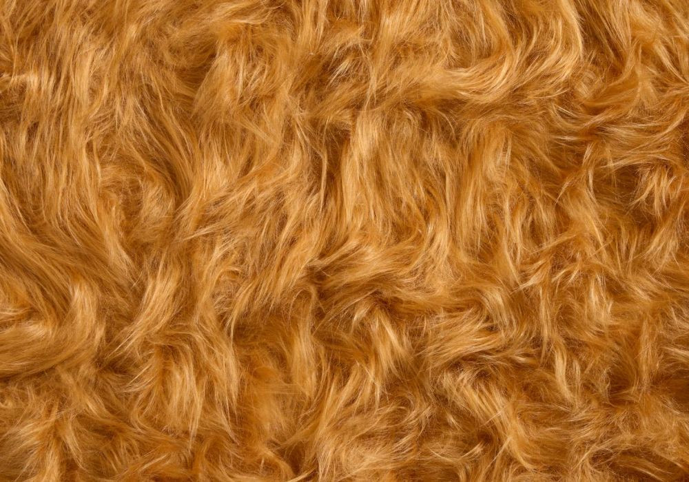 PLuche stof lang haar cognac bruin