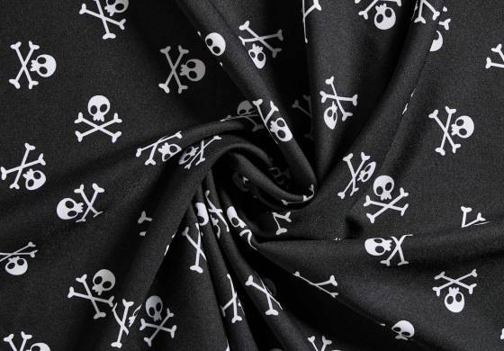 Stof met doodshoofd / piraten print
