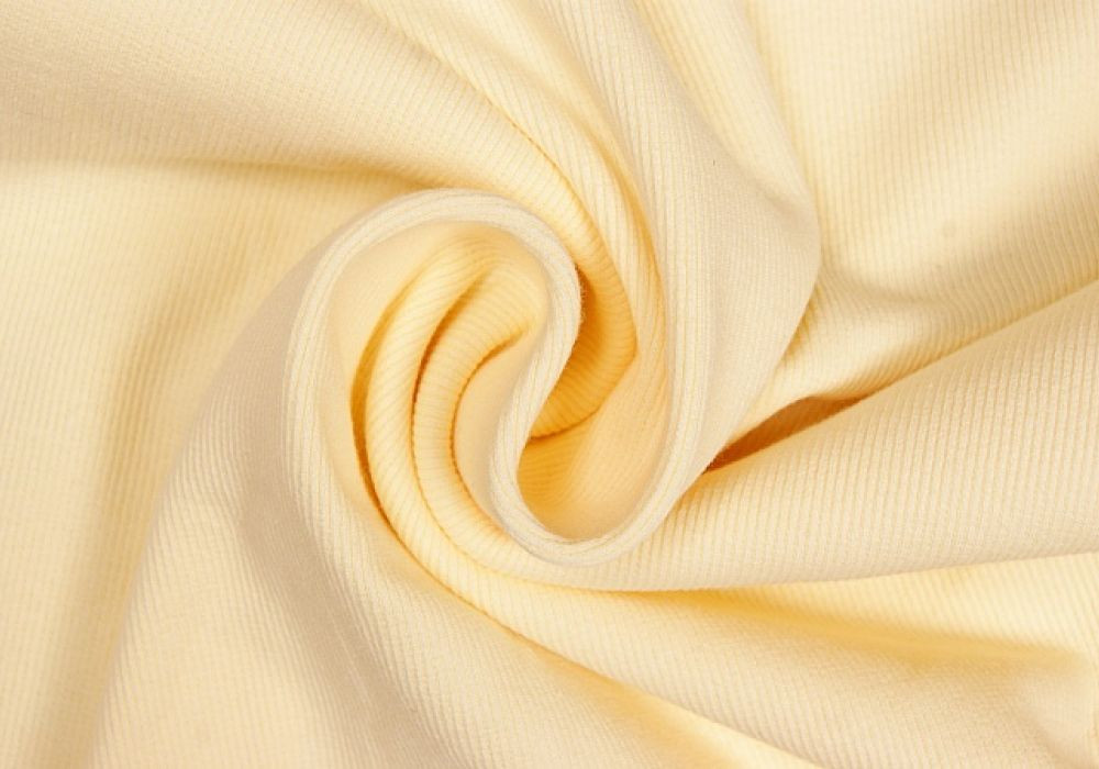 Boordstof tricot rib pastel-geel smal