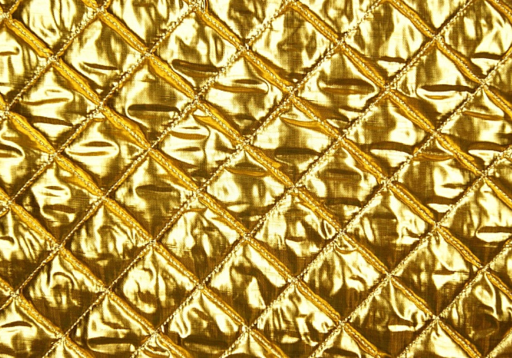 Doorgestikte stof 1 zijde goud