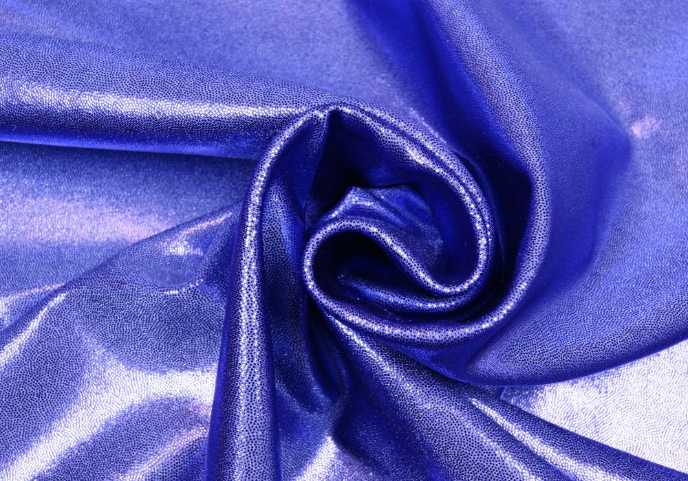 Paarse glitterstof met stretch. Lycra 4-way stretch paars