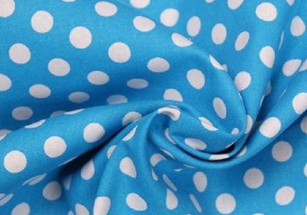 Stof aqua blauw met wit grote stip
