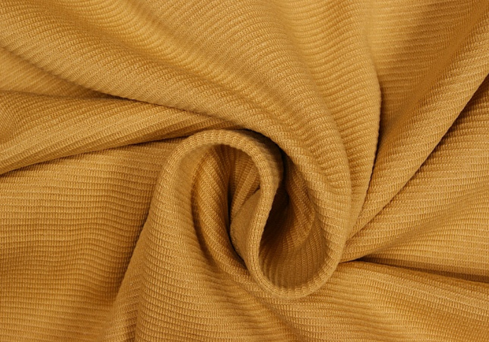Boordstof tricot okergroen
