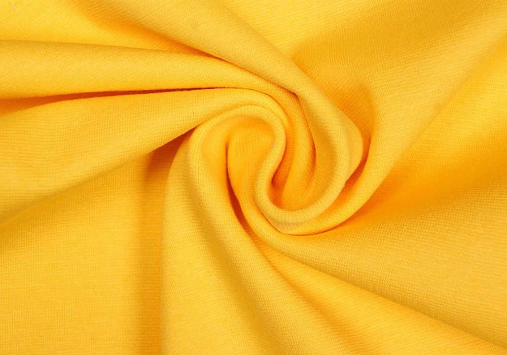 Boordstof tricot okergeel smal