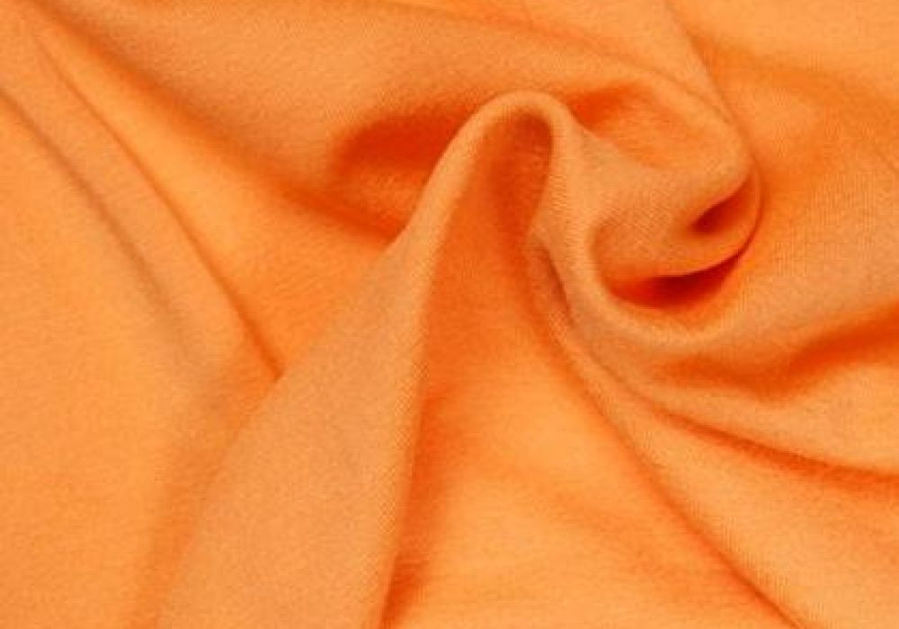 Uni tricot viscose licht-oranje